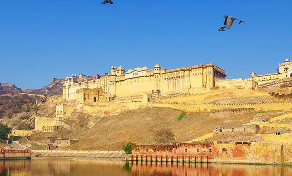 Temple on a hill above a lake in India